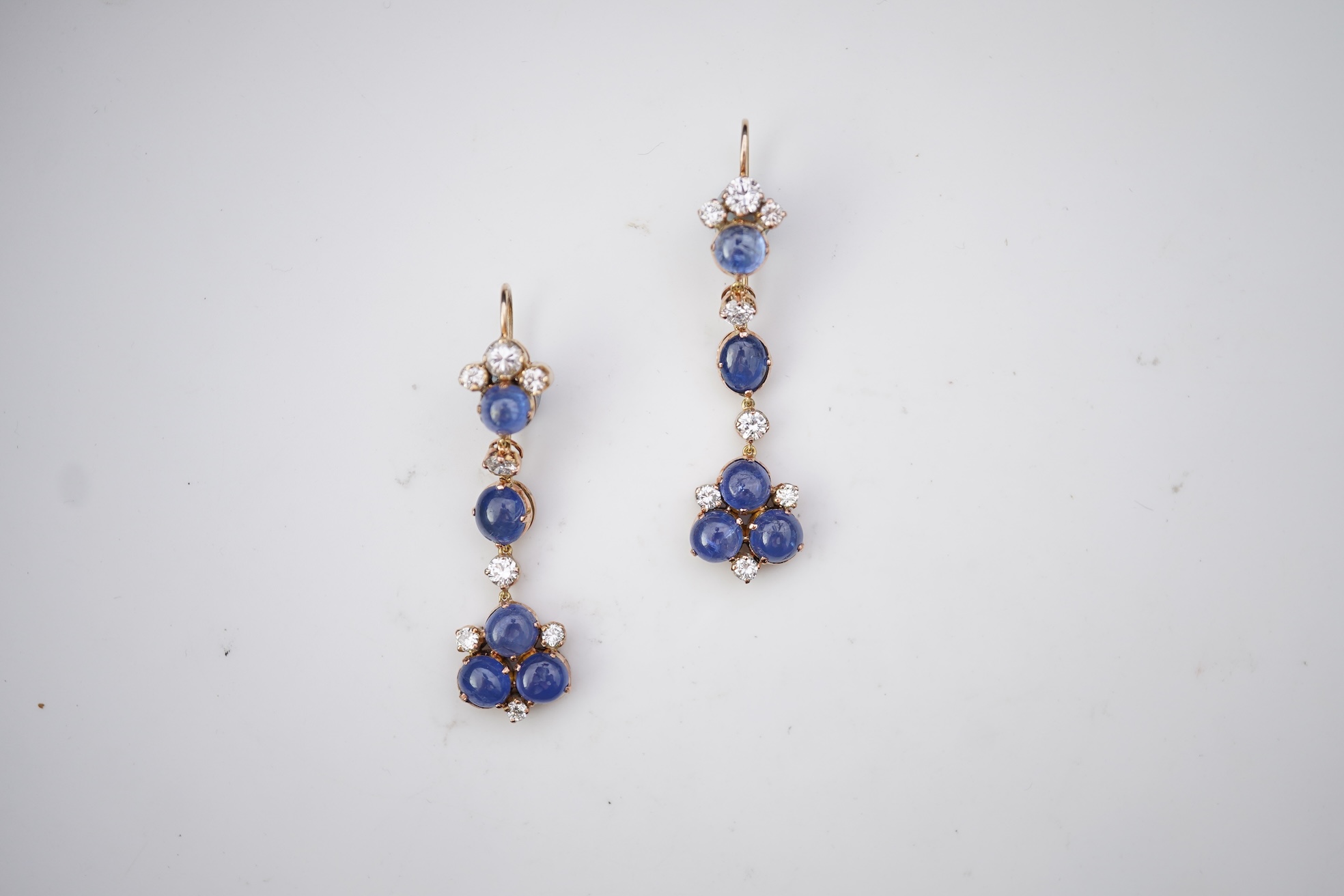 A pair of sapphire and diamond drop earrings